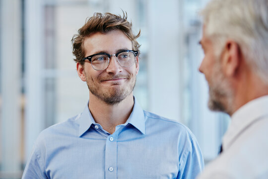 Two businessmen talking together