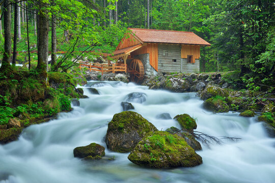 Old Mill at the river Schwarzbach near the famous Golling waterfall in spring, Austria