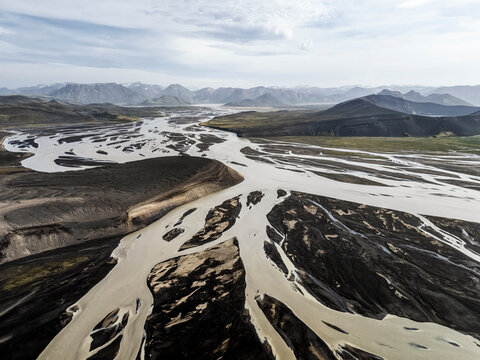 The Tungna� glacial river flows across volcanic sand in Iceland
