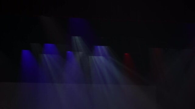 Stage light beam dark blue spotlight concert hall theater stage performance space cone light beam dark scene