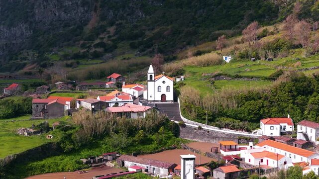 Igreja de Nossa Senhora do Carmo (Church of Our Lady of Mount Carmel) In The Village Of Ponta da Faj&atilde; On Flores Island In The Azores, Portugal. Aerial Shot