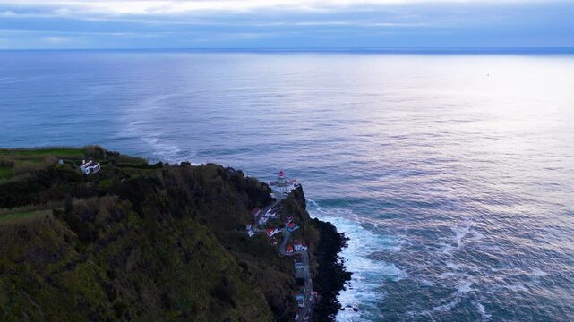 Sunrise At Ponta do Arnel Lighthouse (Farol do Arnel) In Nordeste, S&atilde;o Miguel, Azores, Portugal. Aerial Approach Shot