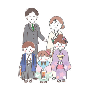 七五三の記念撮影をする五人家族
