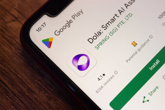Mexico City, MEXICO - Jul 7 2026 : Close-up of a smartphone showing the Dola Smart AI Assistant app listing on the Google Play Store.