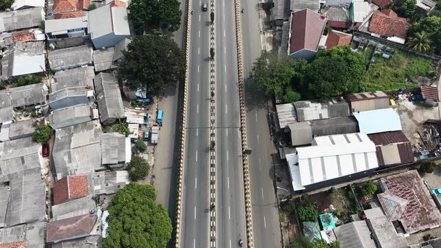 Aerial View of Busy Urban Flyover and Ramayana Department Store