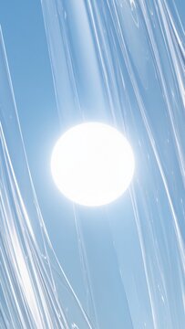 Abstract light blue silky waves with glowing white circle sun vertical background