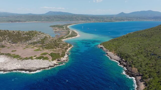 Sykia Beach and Chrisi Ammos near Voidokilia Beach in Pilos, drone pullback panoramic overview