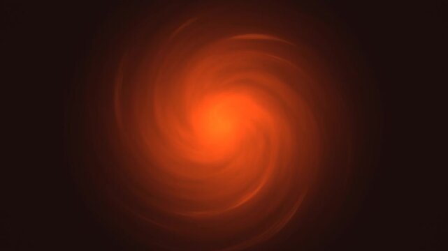 A swirling pattern of orange light forms a vortex against a dark background. The motion creates a sense of depth and energy, capturing attention and curiosity