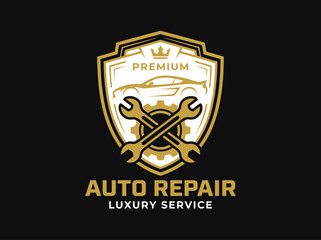 Fototapeta premium Luxury Auto Repair Service Logo Design Featuring Golden Shield Emblem with Car and Wrenches
