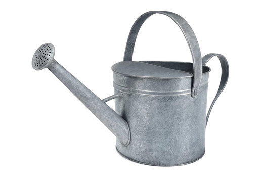 Vintage galvanized metal watering can for garden maintenance isolated on white background with watering, gardening