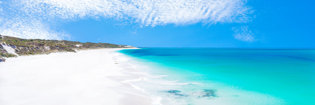 Stunning Wide Sandy White Beach With Deep Blue Ocean