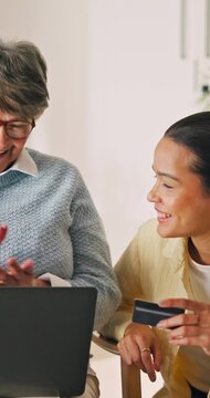 Senior, woman and laptop with credit card help for online shopping assistance or guidance in home. Elderly, female person or shipper with assistant or debit on computer for ecommerce app in house