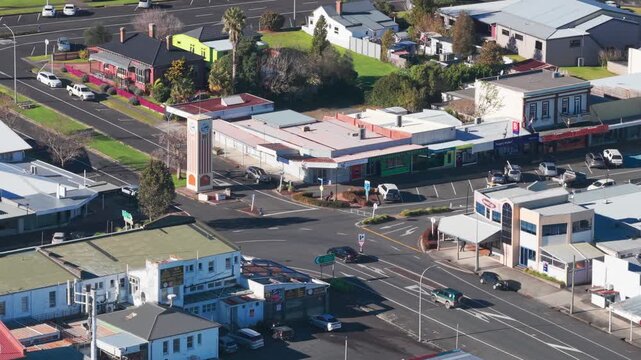 TE AROHA, NEW ZEALAND, 11 July 2026 &ndash; A view of the town centre of Te Aroha, showing the clock tower and various businesses along the main street on a sunny day.