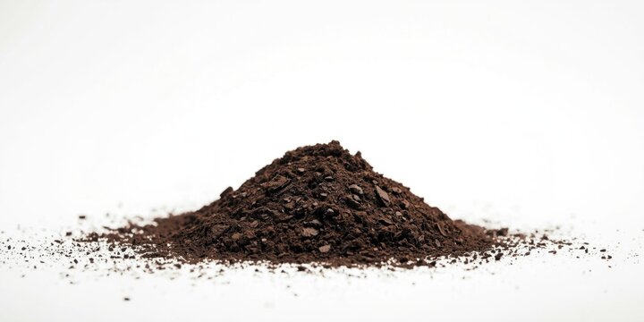 Coffee Grounds Pile Isolated on White with Fine Texture