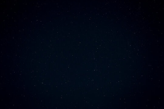 natural backdrop with shadowed edges: view on starry night sky