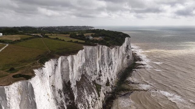 Aerial view of white cliffs and lighthouse in Dover Great Britain