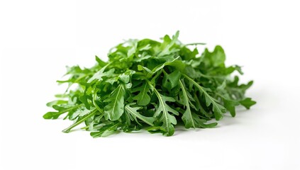Fototapeta premium Fresh Arugula Leaves Piled on White Surface with Bright Lighting