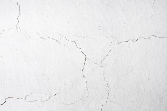 Cracked White Wall Texture with Subtle Veins and Veining.