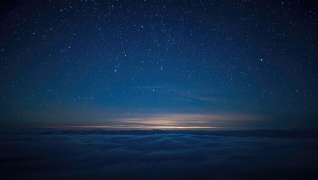 Starry Night Sky Over Cloud Cover at Dusk