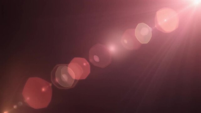 Luxury rose gold cinematic light leak overlay with blush pink and champagne gradients, realistic lens flare, soft bokeh and seamless motion for premium video editing on dark background.