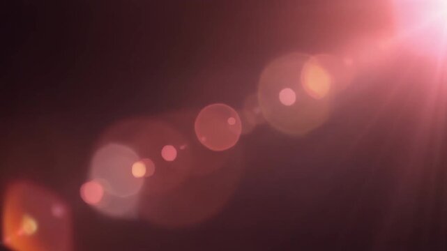 Luxury rose gold cinematic light leak overlay with blush pink and champagne gradients, realistic lens flare, soft bokeh and seamless motion for premium video editing on dark background.