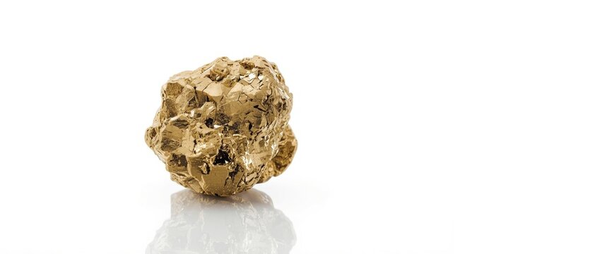 Natural gold nugget on a reflective surface
