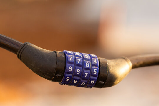 combination lock close up for worksite fence