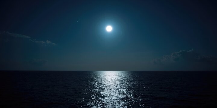 Night sea scene featuring full crystall moon illuminating sky