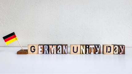 German Unity Day Wooden Letter Blocks With National Flag Celebration