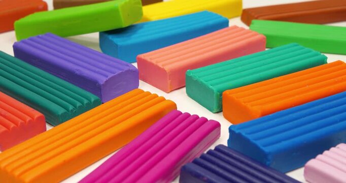 Plasticine blocks for fun and skillful modeling. Bright fun clay