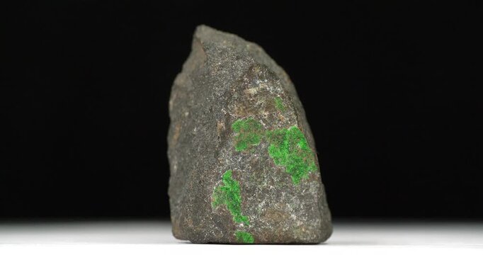 Uvarovite - calcium-chromium silicate mineral,an emerald-green variety of garnet
