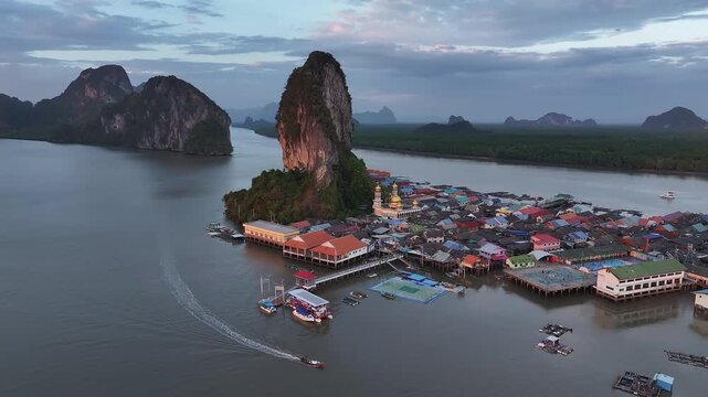 Aerial view of floating fishing village at dawn, Thailand