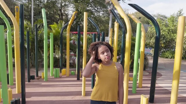 African american teen girl posing at playground
