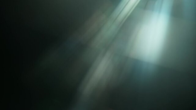Real Cinematic Lens Flare Overlay on Black Background at 1000fps Slow Motion.