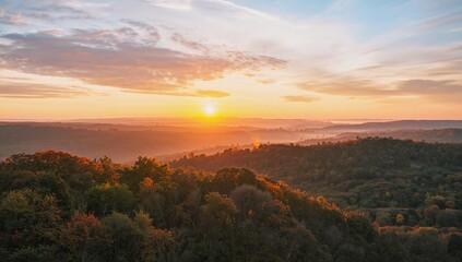 Fototapeta premium Sunrise over Autumn Hillside Landscape with Colorful Foliage