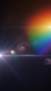 Elegant rainbow prism cinematic light leak overlay with spectral gradients, realistic lens flare, diffraction colors and seamless looping motion for premium video editing on dark background.
