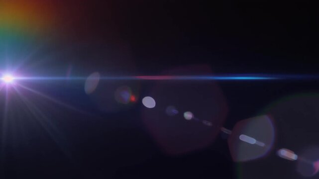 Elegant rainbow prism cinematic light leak overlay with spectral gradients, realistic lens flare, diffraction colors and seamless looping motion for premium video editing on dark background.