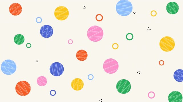 Vibrant abstract animation featuring colorful patterned circles and geometric shapes on a light background.