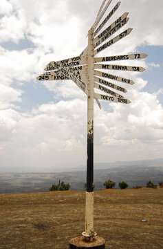 Kenya, Nakuru, Lake Nakuru National Park, direction panel  in km to all over the world