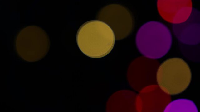 Blurred colorful bokeh lights on a dark background, Colorful bokeh lights on dark background