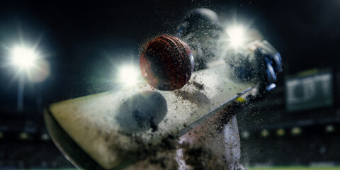 Extreme macro view of red cricket ball striking wooden bat with exploding dirt under stadium lights. Concept of sports impact, tournament advertising, professional competition and branding. © master1305