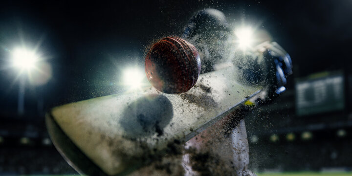 Extreme macro view of red cricket ball striking wooden bat with exploding dirt under stadium lights. Concept of sports impact, tournament advertising, professional competition and branding.