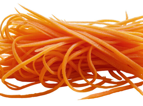 Isolated fresh vibrant orange julienned carrots, healthy vegetable food ingredient