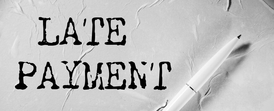 paper with LATE PAYMENT text