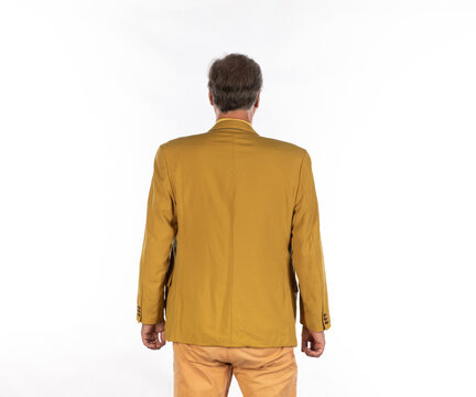 Businessman man in yellow suit back view isolated on white background