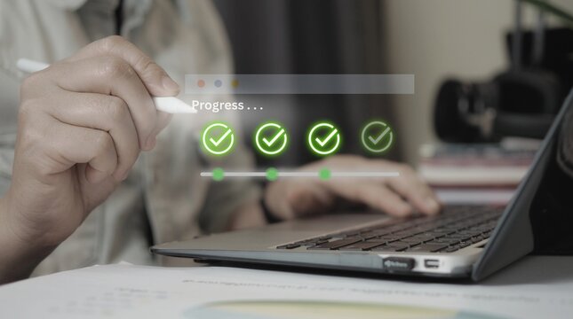Professional completing online digital assessment task with virtual checkmarks indicating successful task completion and progress bar on screen