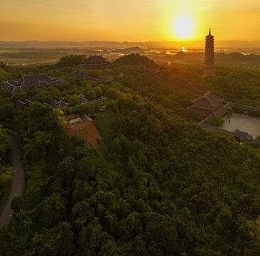 Aerial view of Bai Dinh pagoda and mountains at sunset in Ninh Binh province, Vietnam