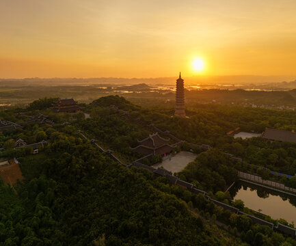 Aerial view of Bai Dinh pagoda and mountains at sunset in Ninh Binh province, Vietnam