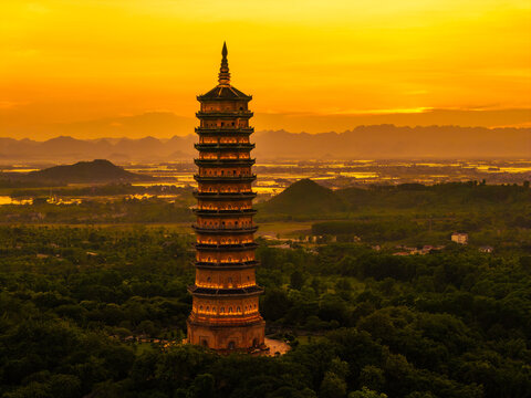 Aerial view of Bai Dinh pagoda and mountains at sunset in Ninh Binh province, Vietnam