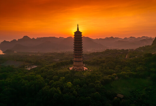 Aerial view of Bai Dinh pagoda and mountains at sunset in Ninh Binh province, Vietnam